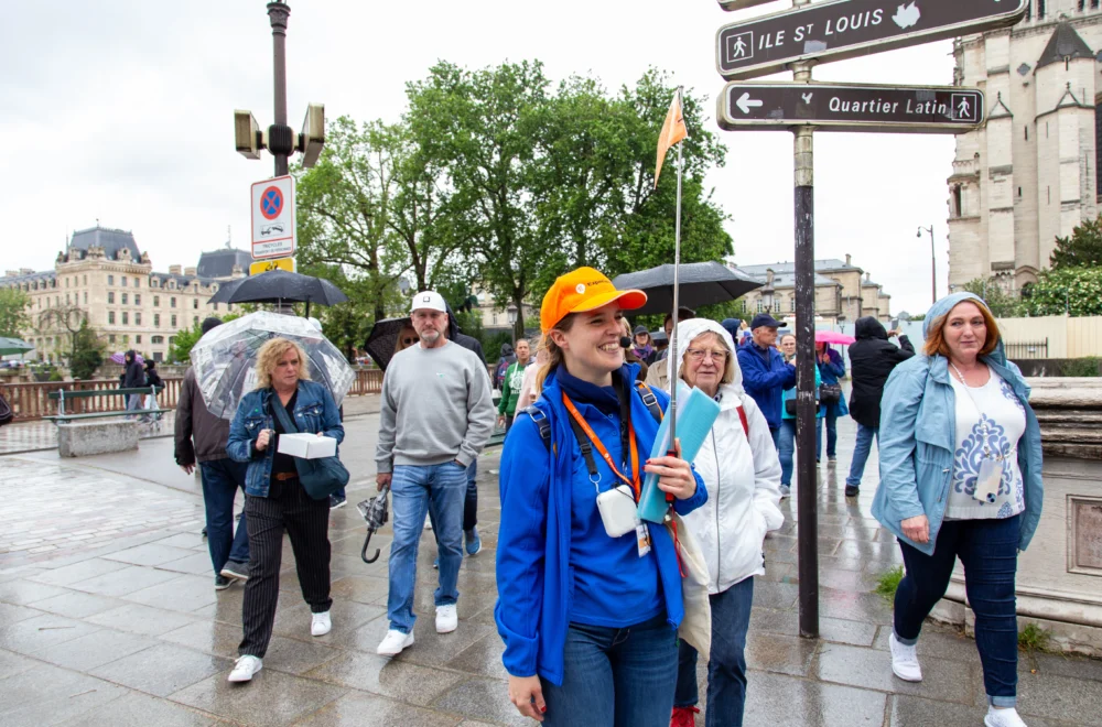 Tour Guide leading group during Notre-Dame Outdoor Walking Tour