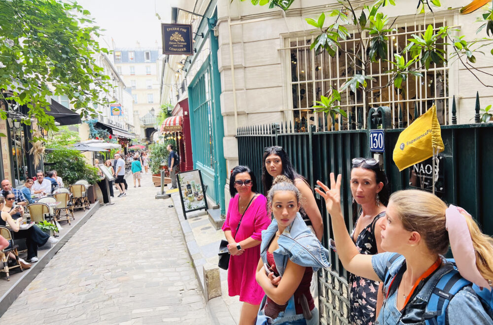 Cour du Commerce Saint-André with tour guide leading group