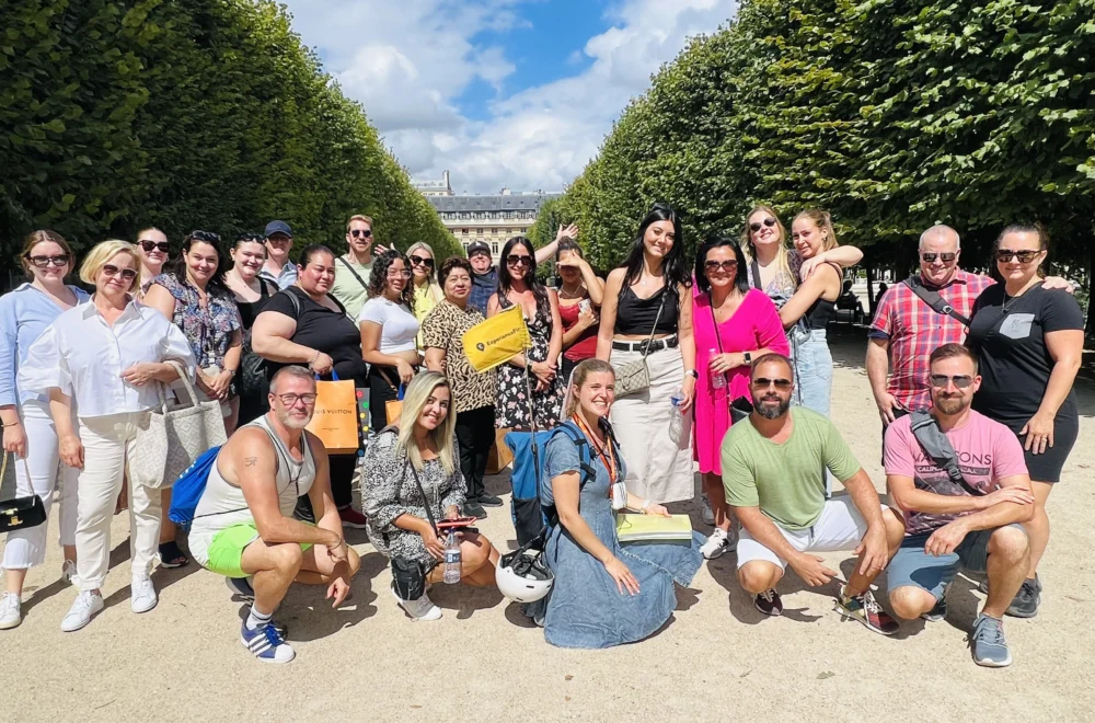 Unofficial Emily in Paris Tour group shot at Palais-Royal Garden