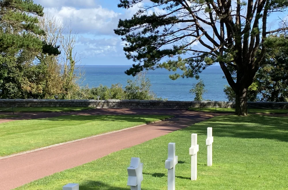 View of ocean and crosses in Normandy American Cemetery and Memorial