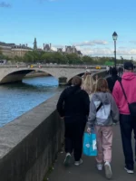 Guests on Paris Ghost Tour walking by the Seine