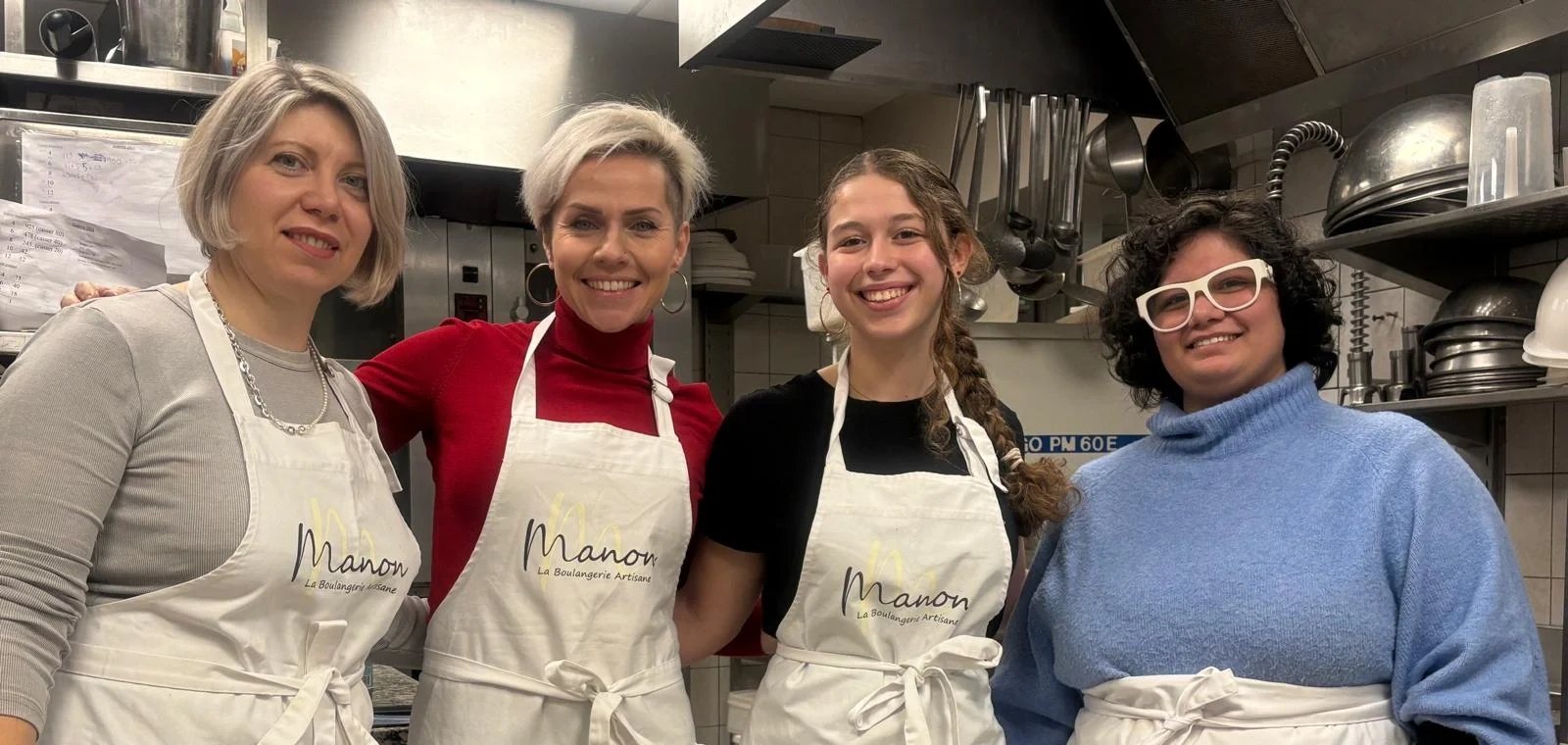 Guests and guide inside bakery