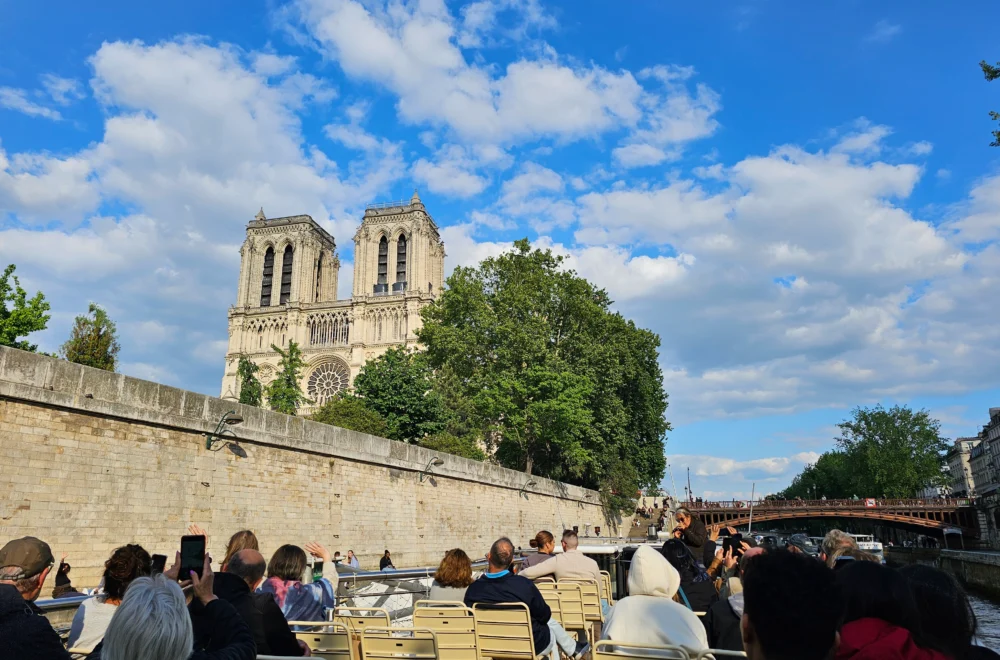 View of Notre-Dame Cathedral during Seine River cruise in Paris