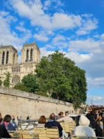View of Notre-Dame Cathedral during Seine River cruise in Paris