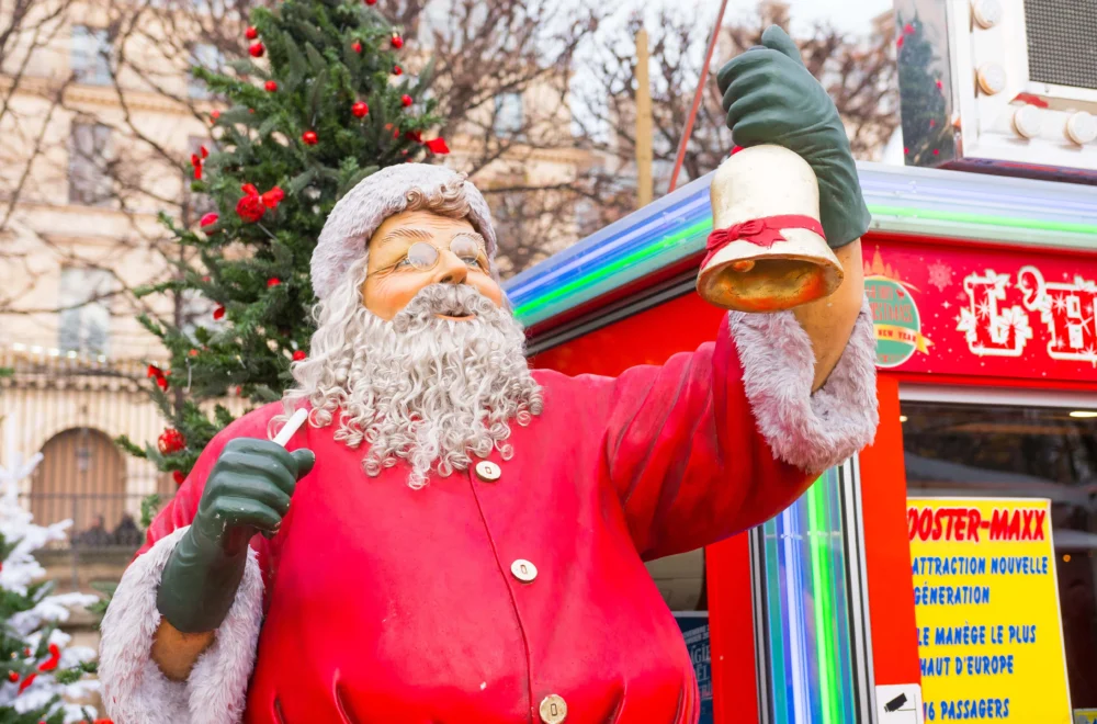 Santa Claus statue on Christmas market tour in Paris