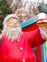 Santa Claus statue on Christmas market tour in Paris