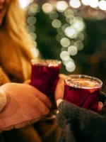 Close up of mittens and drinks during Paris Christmas Lights private guided tour