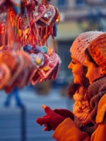 Guests looking at Christmas Market stall during private Paris guided tour