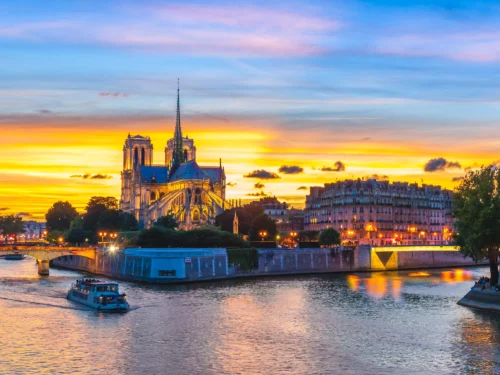 Sunset river seine cruise going past Notre-Dame during Private Paris guided tour