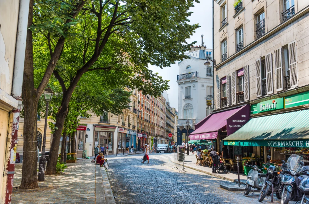 View of cobblestone street in Montmartre during a sunny day