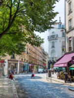 View of cobblestone street in Montmartre during a sunny day