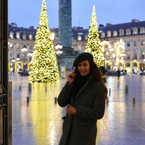 Woman smiling during private Paris Christmas Lights guided tour