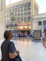 Tour guide talking with guests on the ExperienceFirst Haunted Hollywood Walking Tour