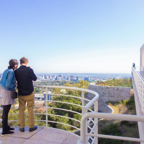 A couple admiring the view of Los Angeles during Getty Center Walking Tour