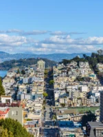 A panoramic view of neighborhoods of Telegraph Hill, Coit Tower and San Francisco Bay, looking from top of Russian Hill, San Francisco