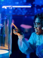 California Academy of Sciences visitors looking at specimen