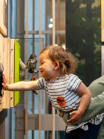 Mom and child enjoying the exhibits at the California Academy of Sciences