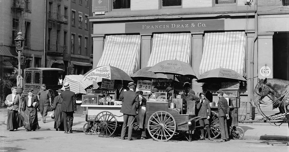 Historic image of lunch carts in the streets of NYC
