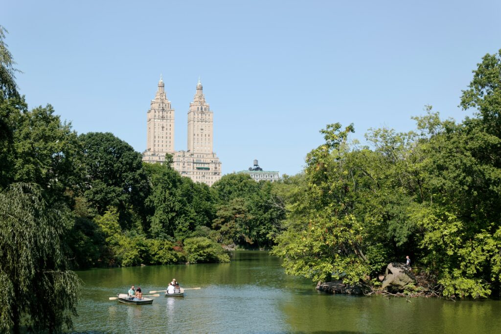 People boating in the Lake in Central Park NYC