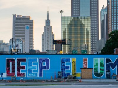 Deep Ellum mural with the name of the neighborhood