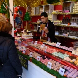 Food-and-sweet-stalls-in-Christmas-market-in-Tuileries-Gardens-Paris-France-min-500×375