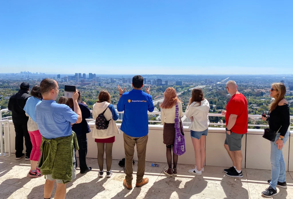 Guide on Getty Center tour showing guests the skyline views of LA