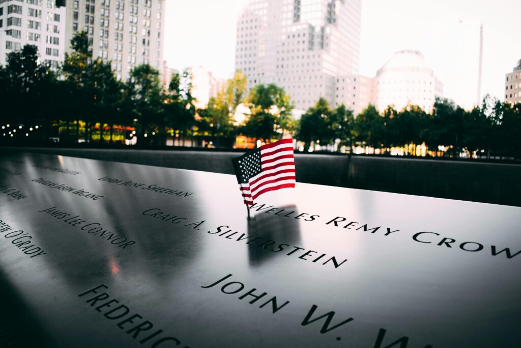 US Flag on Memorial Plaque in 9/11 Memorial in New York
