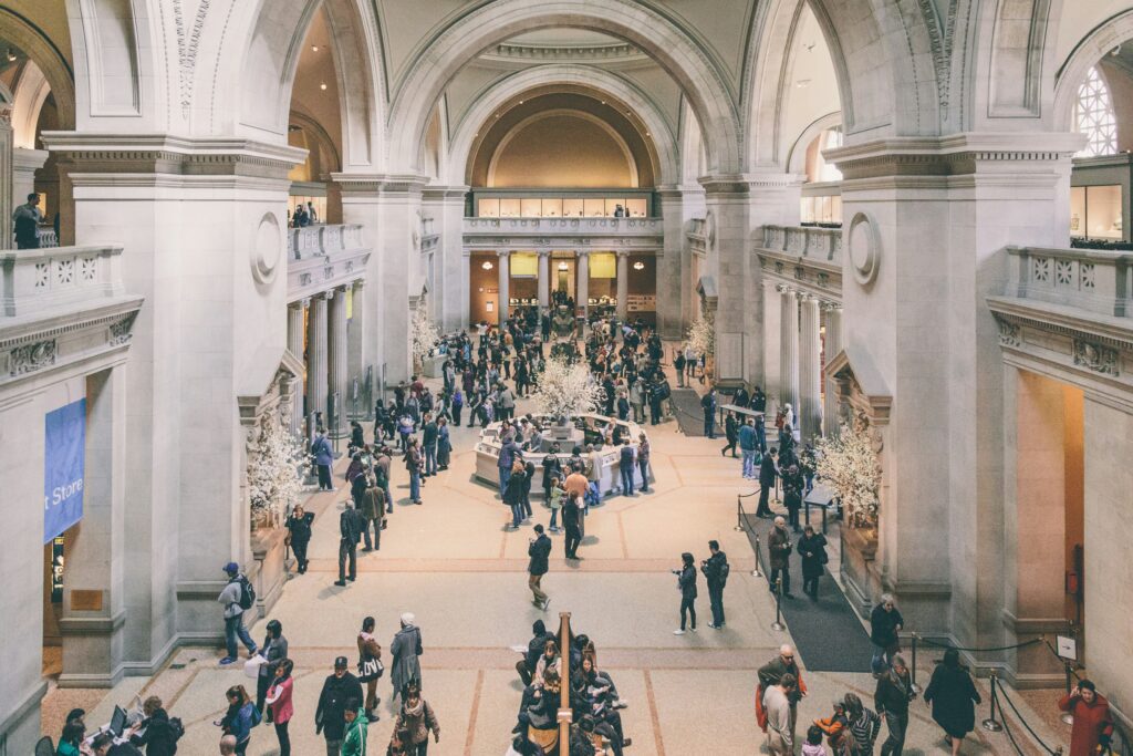 People walking through the Met in NYC