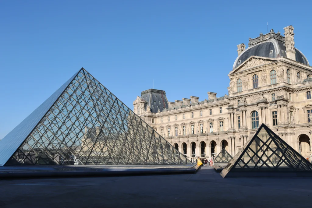 Louvre Museum pyramids on a sunny day