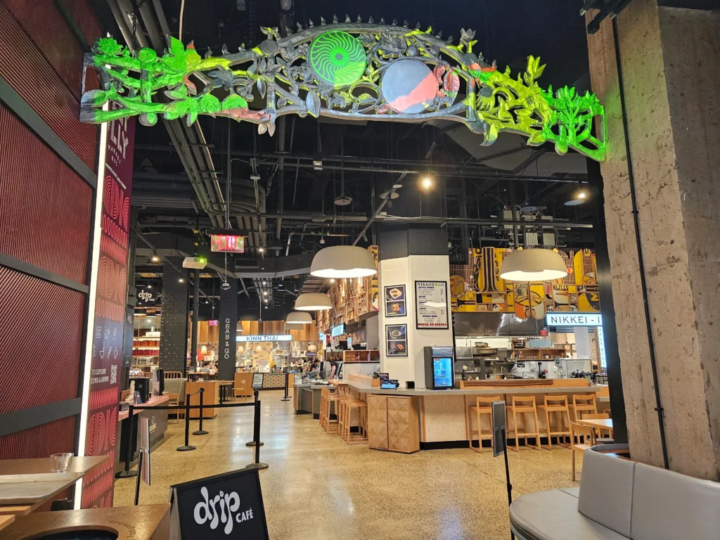 Entrance to Olly Olly Market, a food hall in NYC